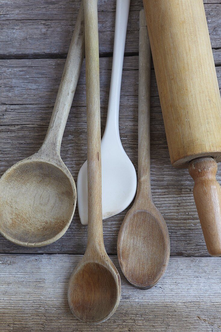 Various cooking spoons and a rolling pin