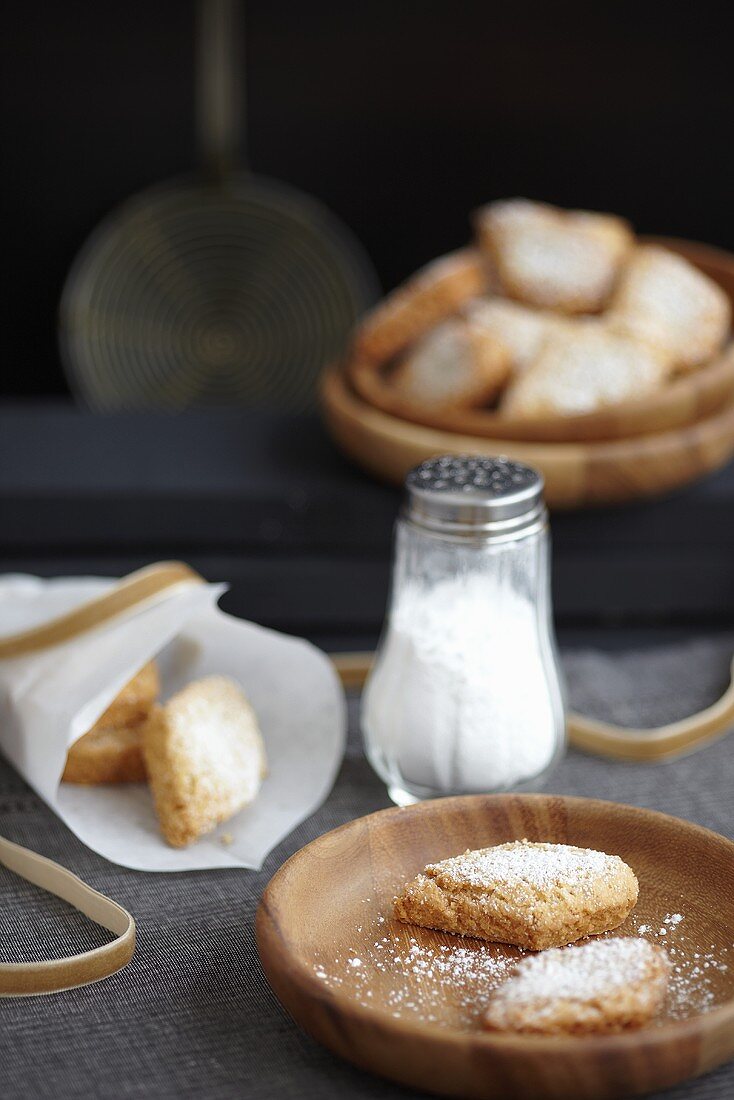 Drop-shaped almond shortbreads with icing sugar