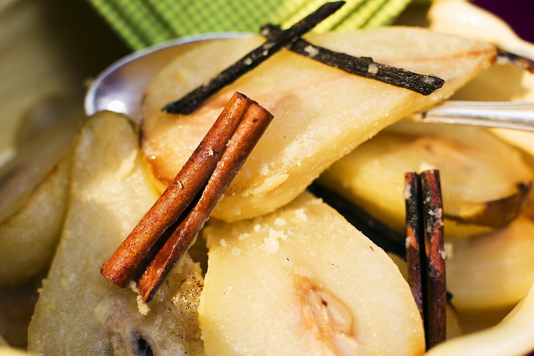 Poached lemons and pears with vanilla and cinnamon