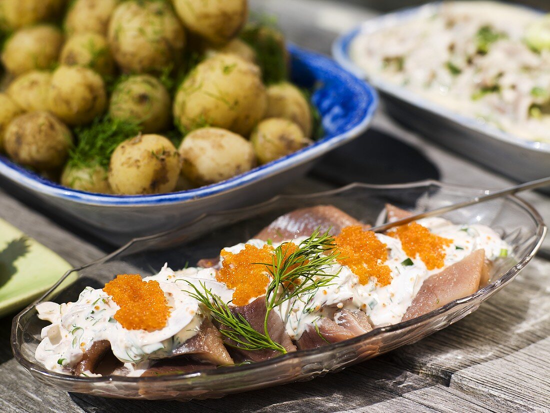 Soused herring with a creamy sauce and faux caviar