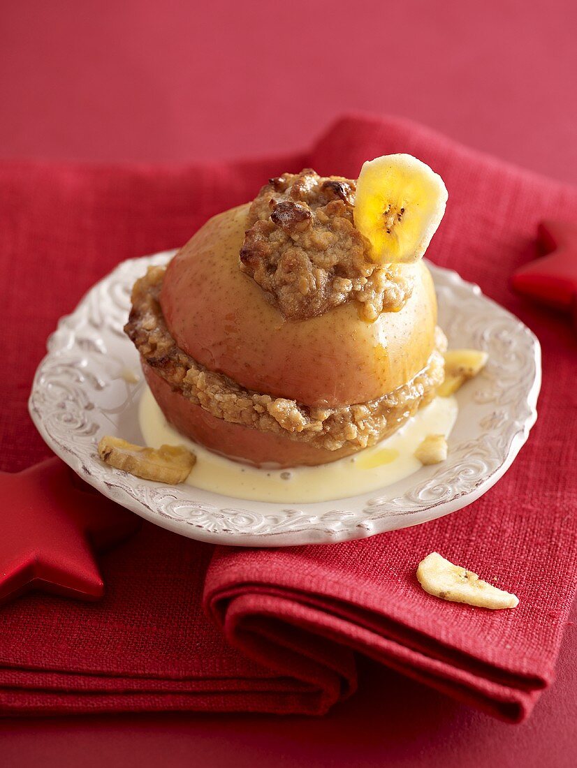 A baked apple with a banana and peanut butter filling