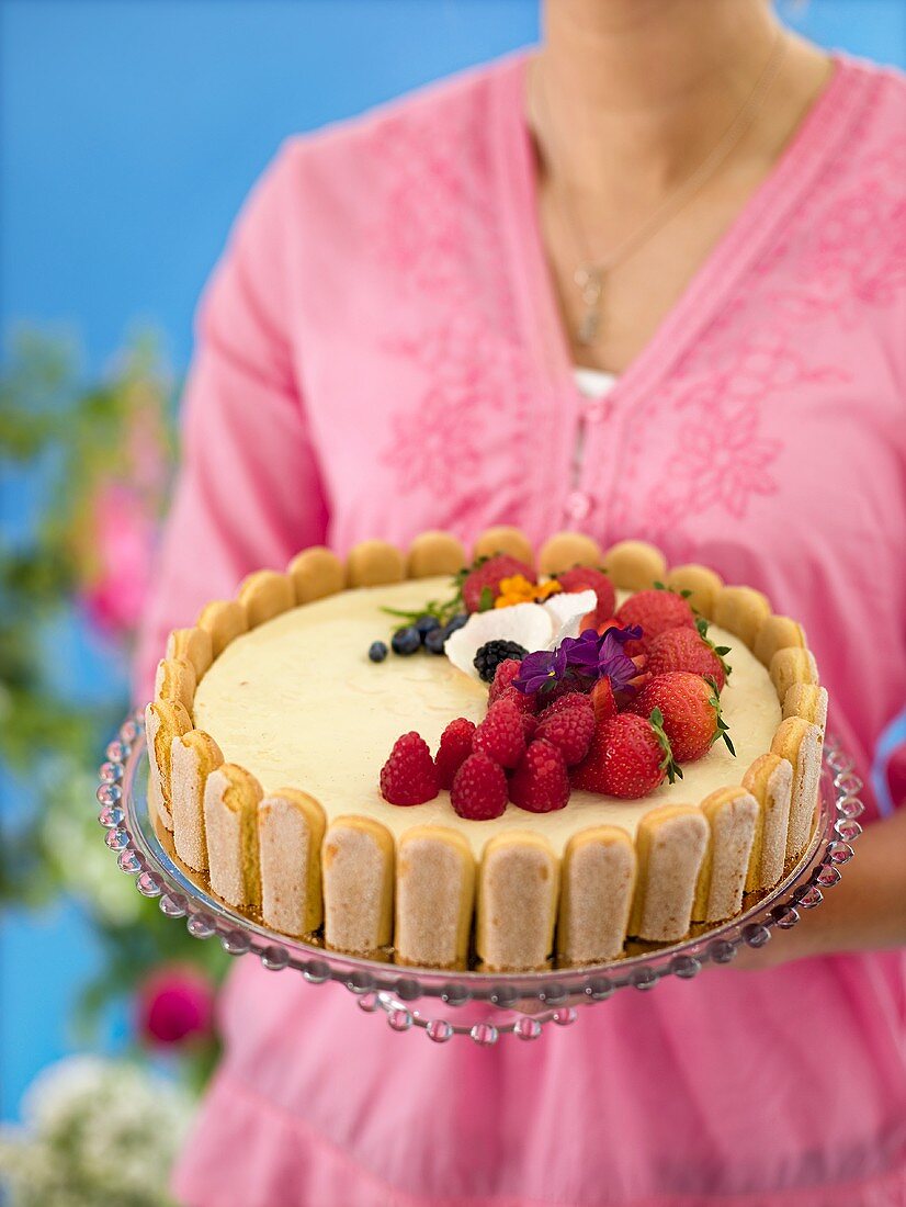 A summer tart with vanilla cream and berries