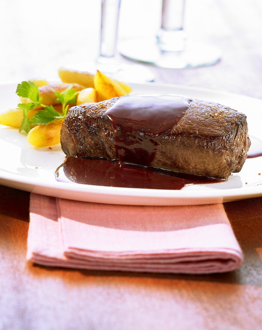 Venison steak with a red wine and redcurrant sauce