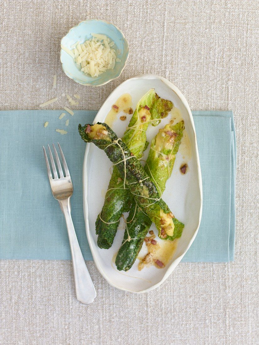 Three stuffed savoy cabbage leaves with polenta stuffing