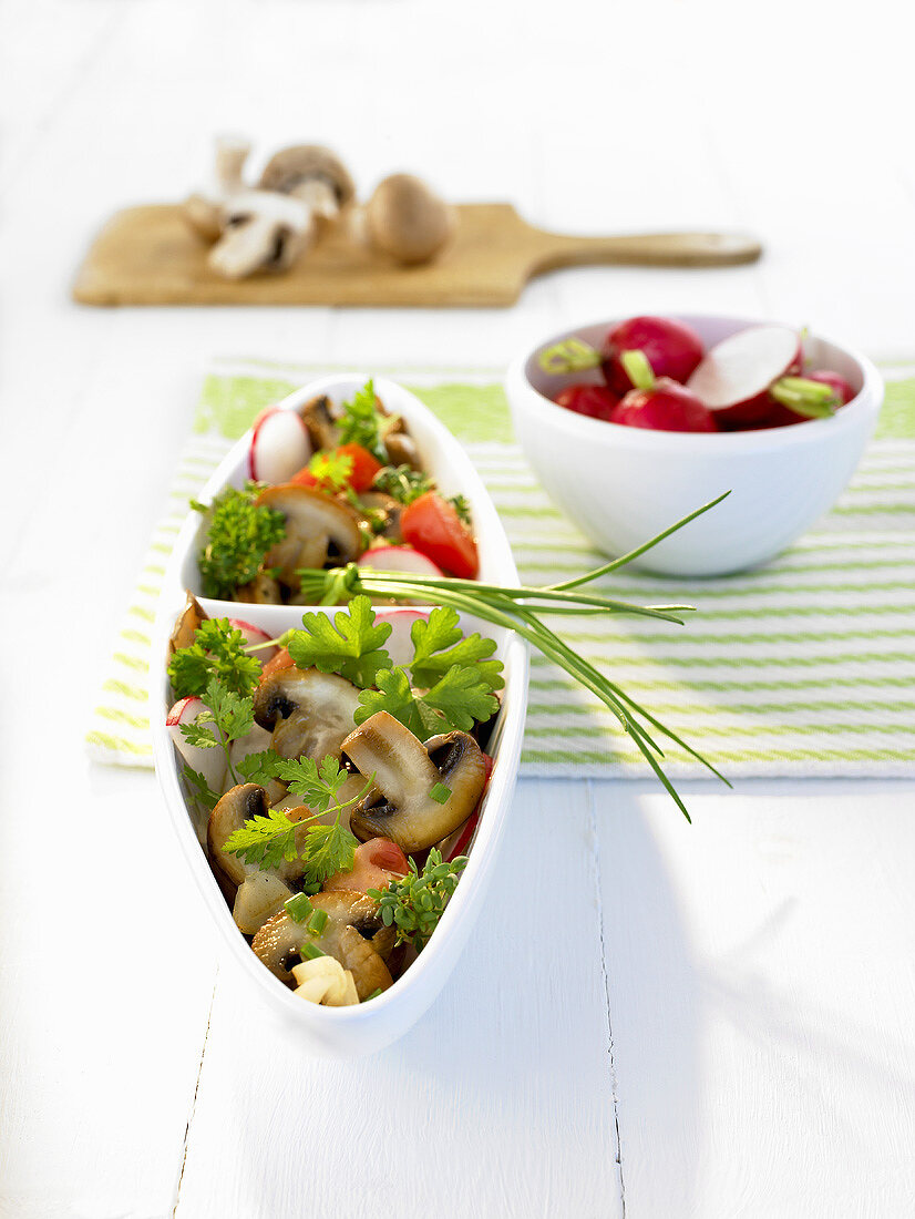 Herb salad with king oyster mushrooms and radishes