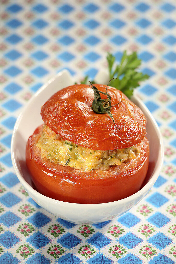 A baked stuffed tomato