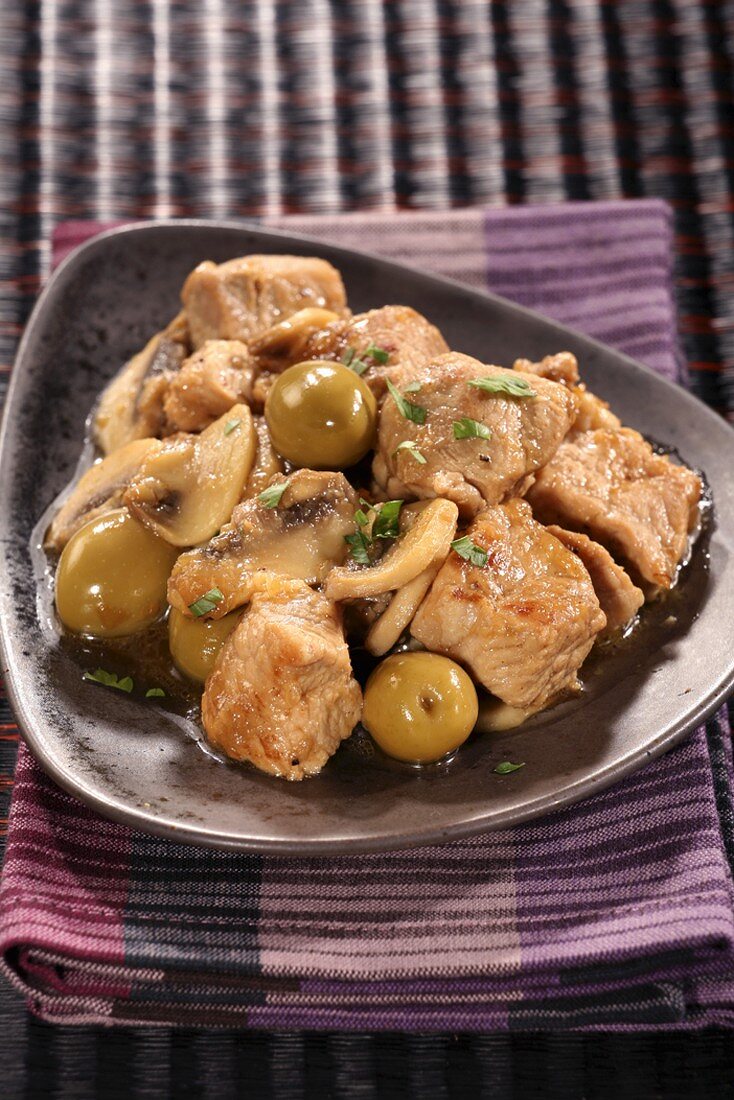 Braised pork with mushrooms and olives
