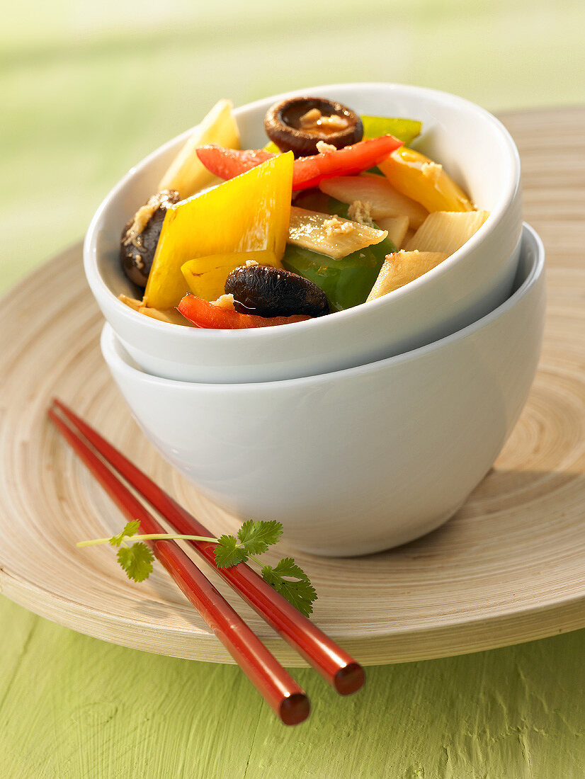 Fried bamboo shoots with peppers and shiitake mushrooms