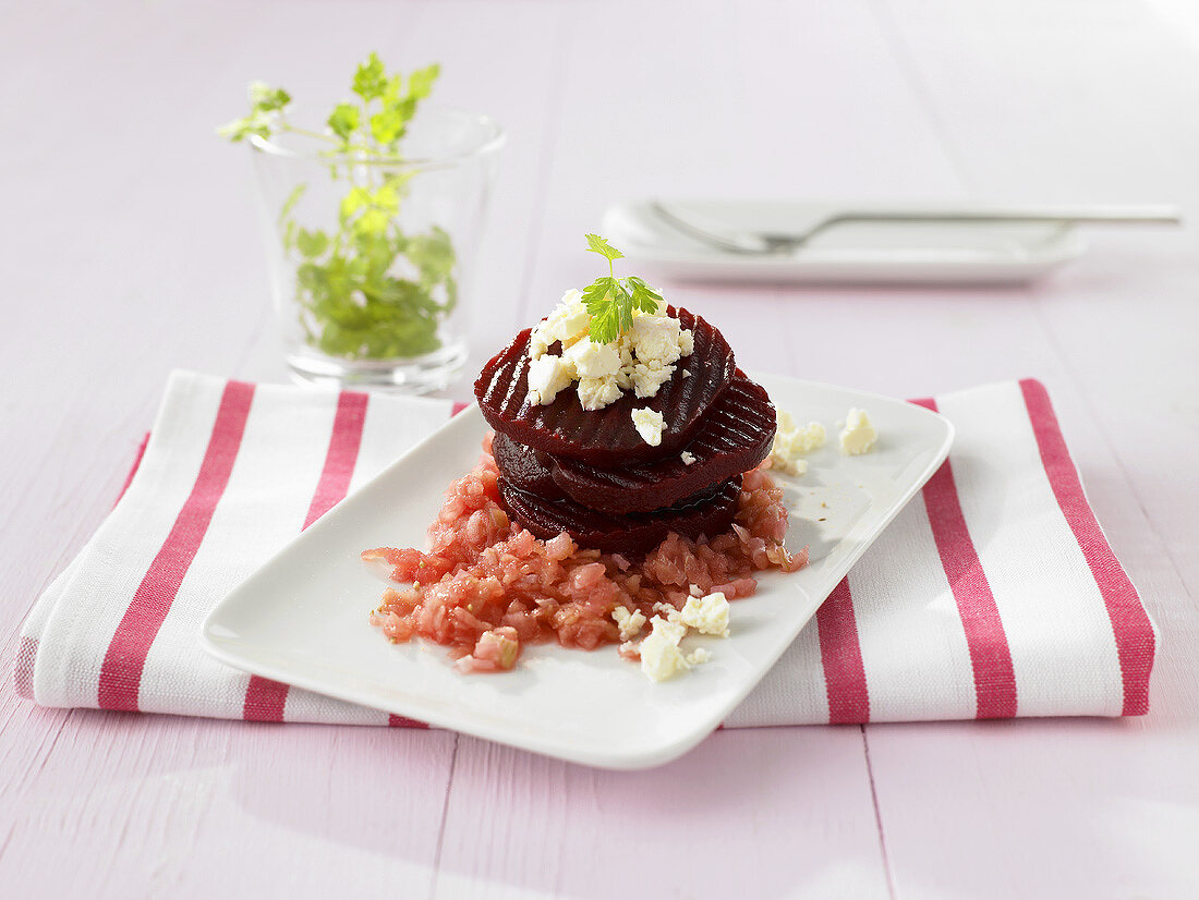 Beetroot tower with apple and sheep's cheese