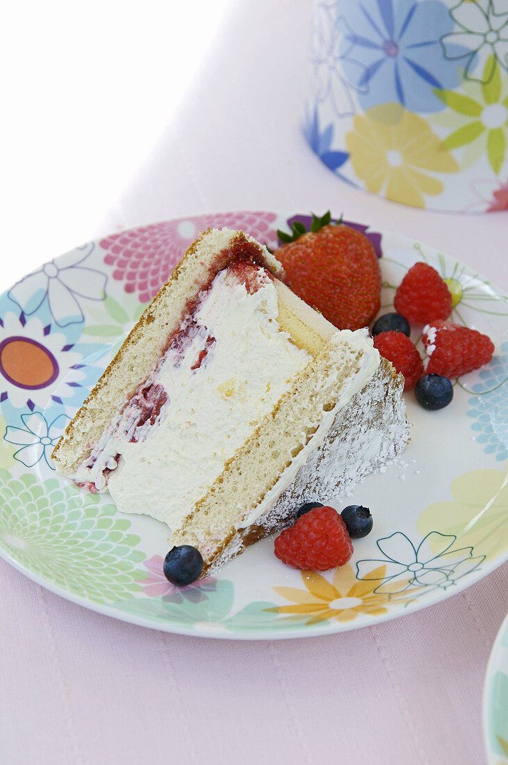 A piece of berry cream cake
