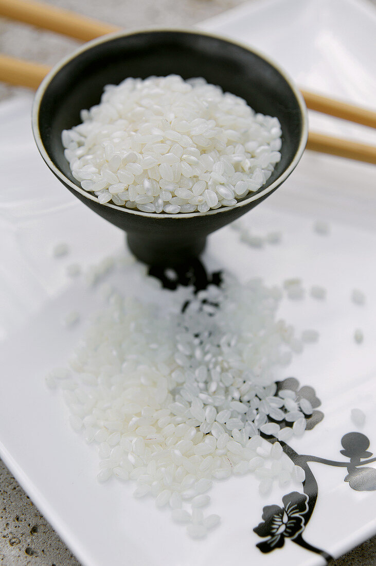 Short-grain rice in a small dish and on a plate