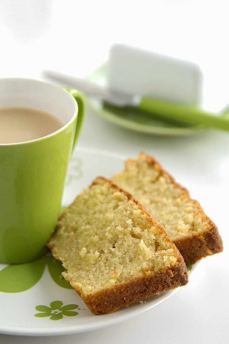 Two pieces of spiced apple cake with a cup of tea