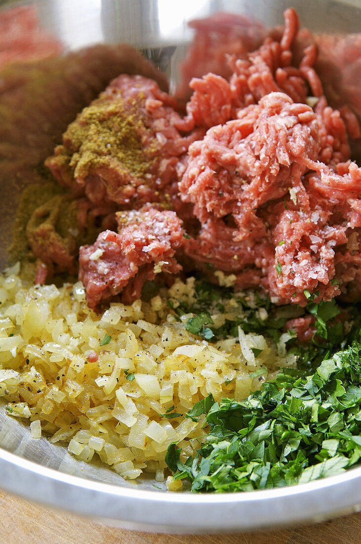 Minced beef with herbs and spices for burgers