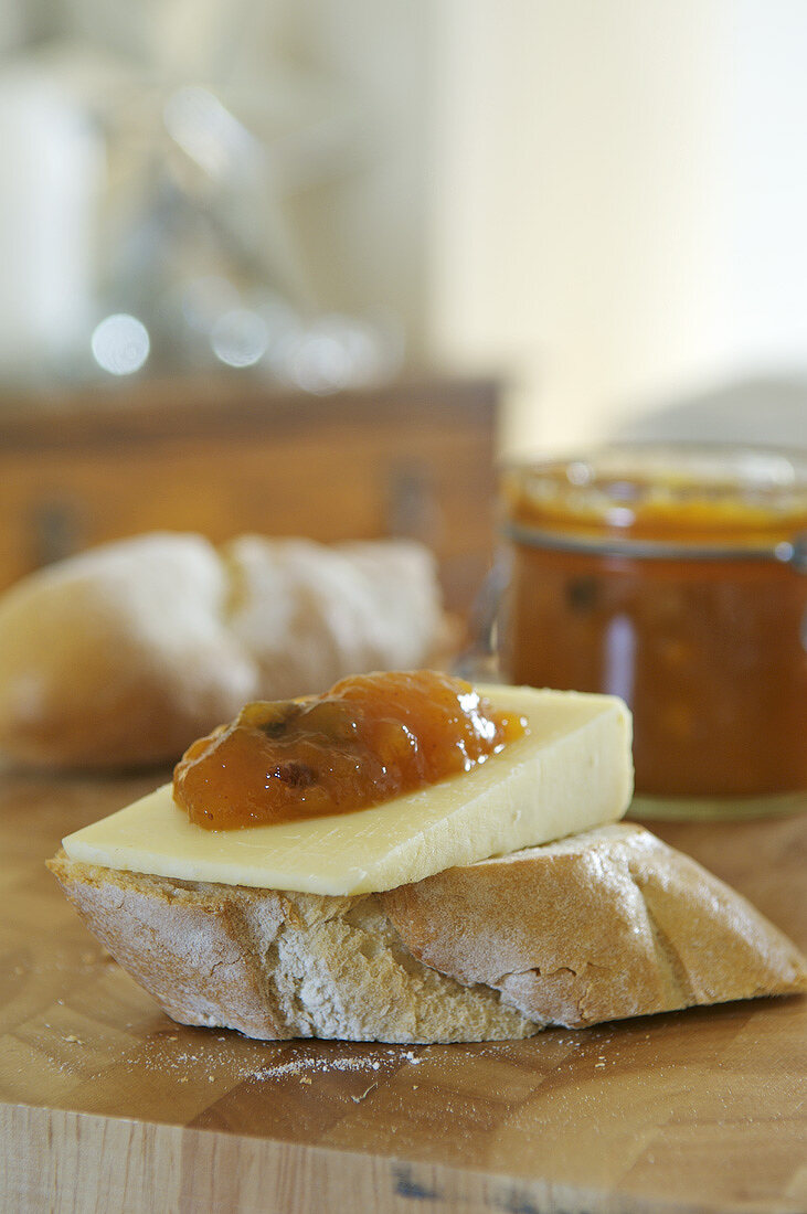 Cheese and mango chutney on a slice of baguette