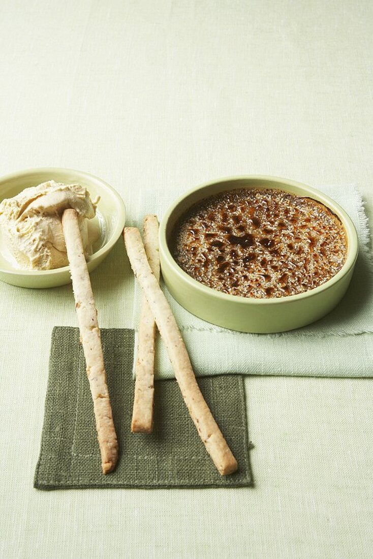 Coffee crème brûlée with whisky ice cream and nut sticks
