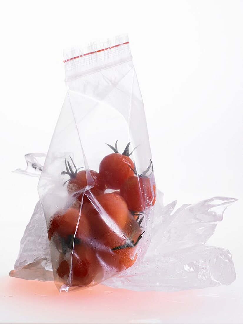 Frozen cherry tomatoes in a freezer bag