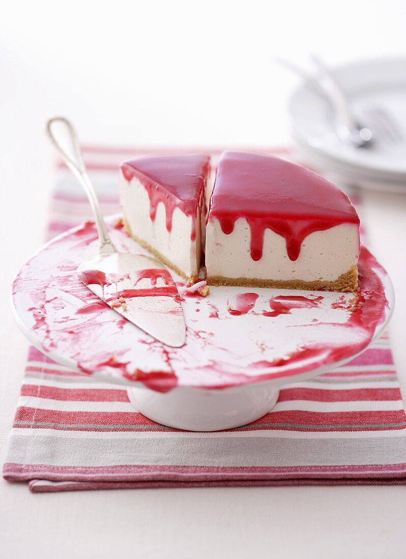 Pieces of cheesecake with cranberry topping