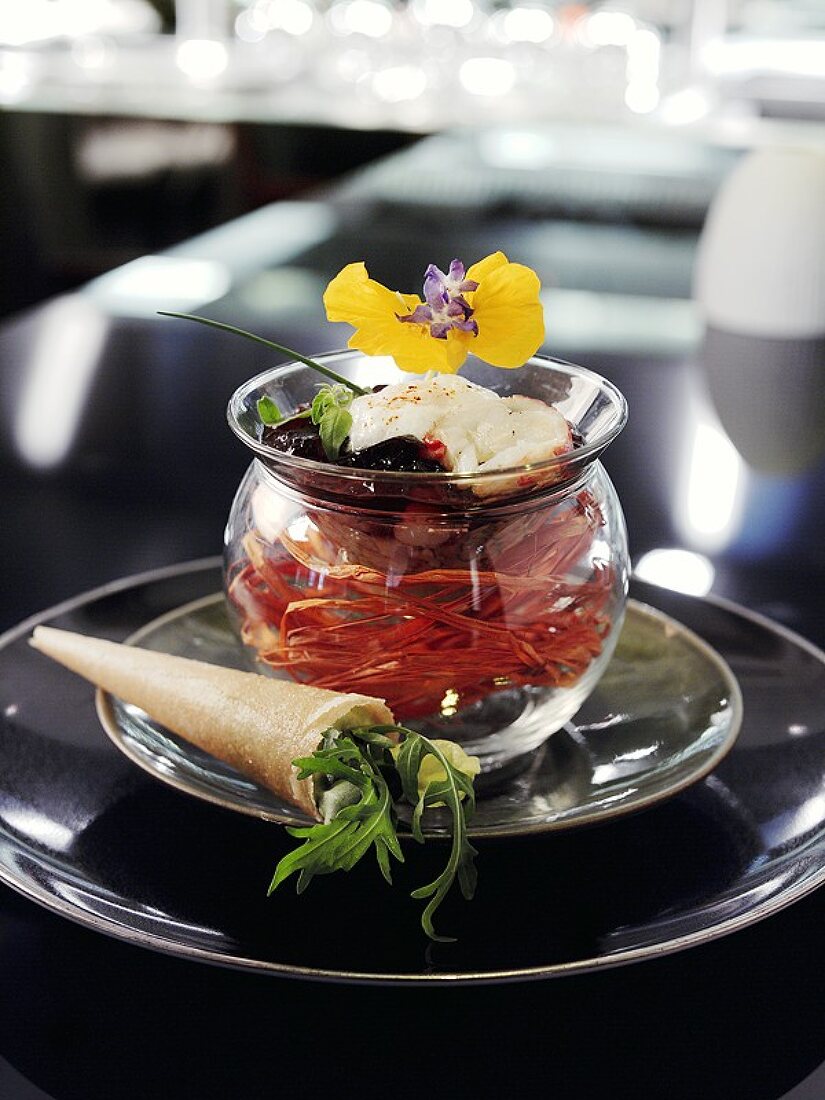 Lobster with shellfish jelly in a glass bowl