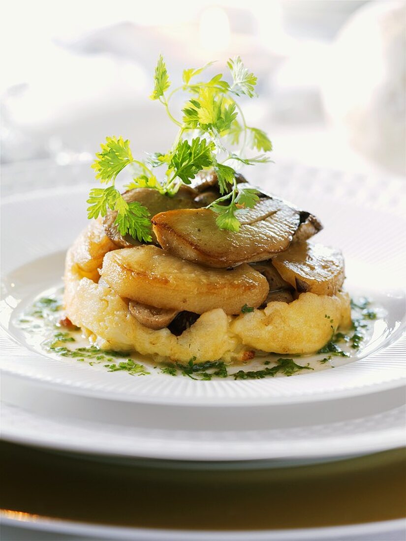 Fried ceps on potato gratin