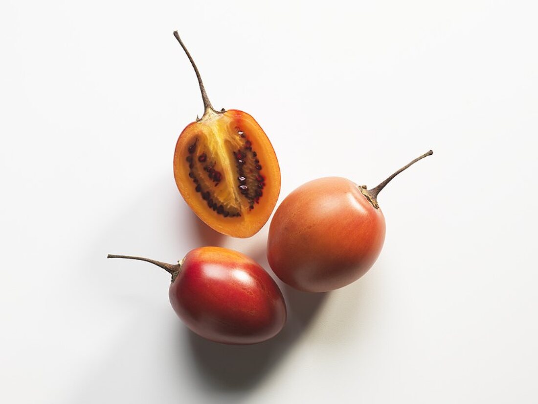 Tamarillos, two whole and one half