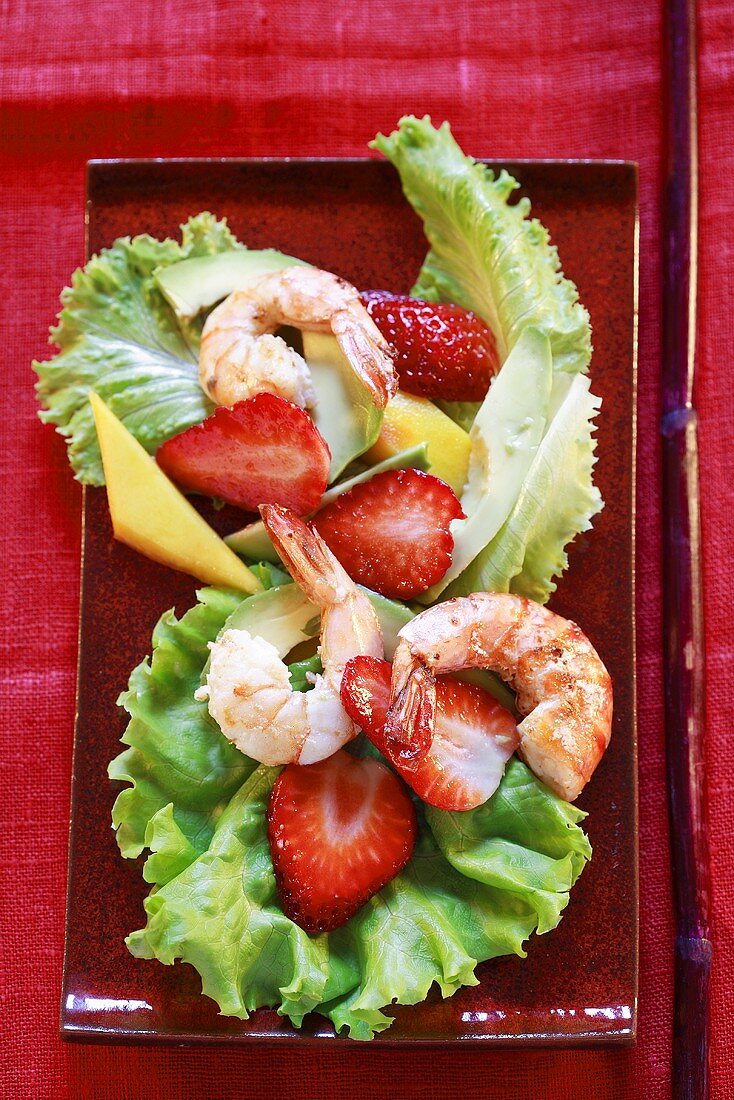 Avocado, shrimp, strawberry and mango salad