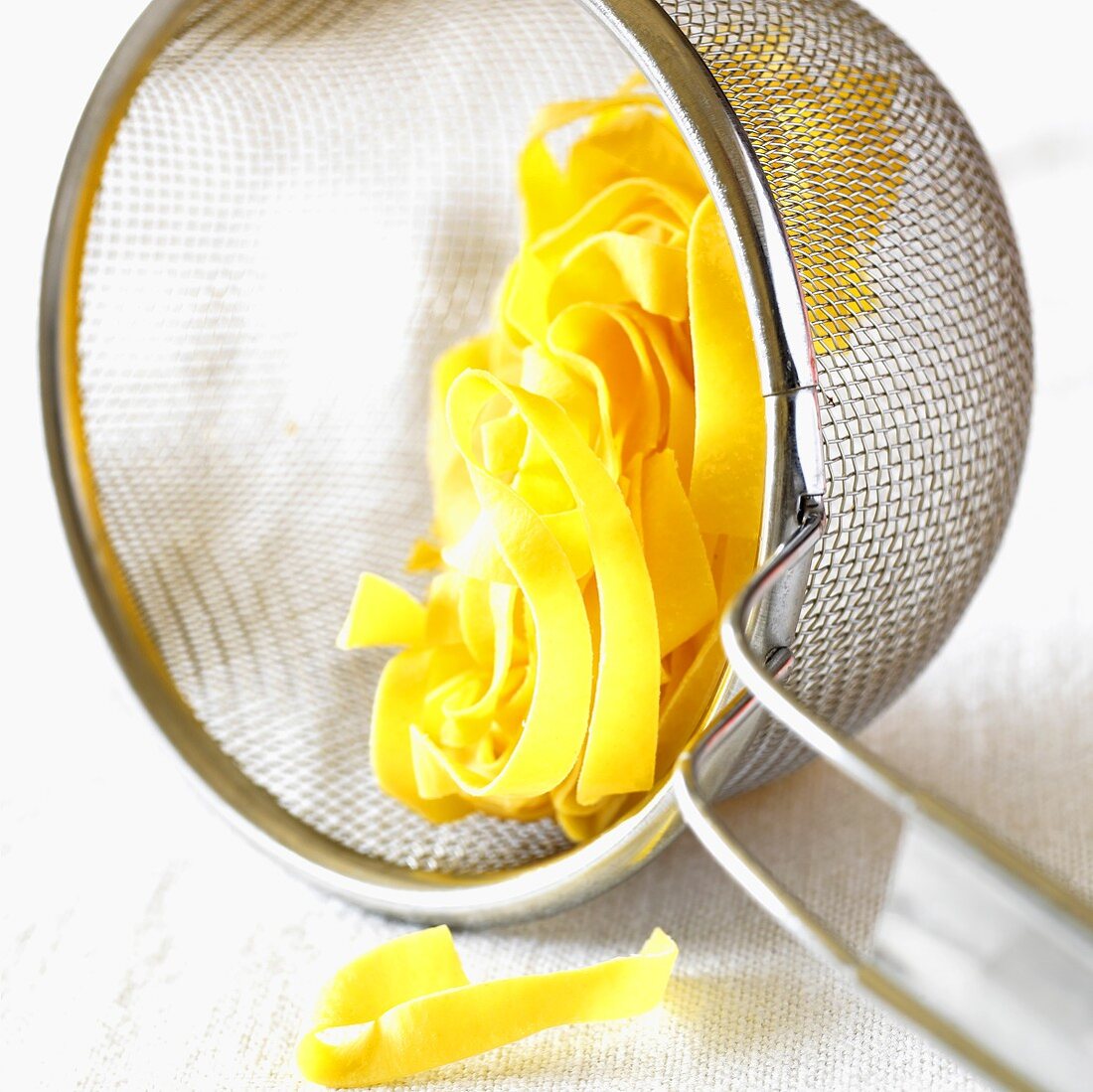 Tagliatelle in a sieve