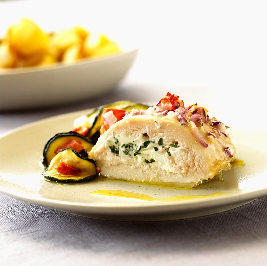 Stuffed chicken breast with courgettes