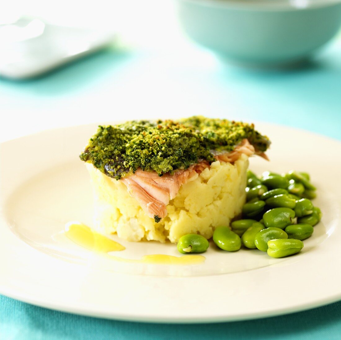 Salmon trout with herb crust on crushed potatoes