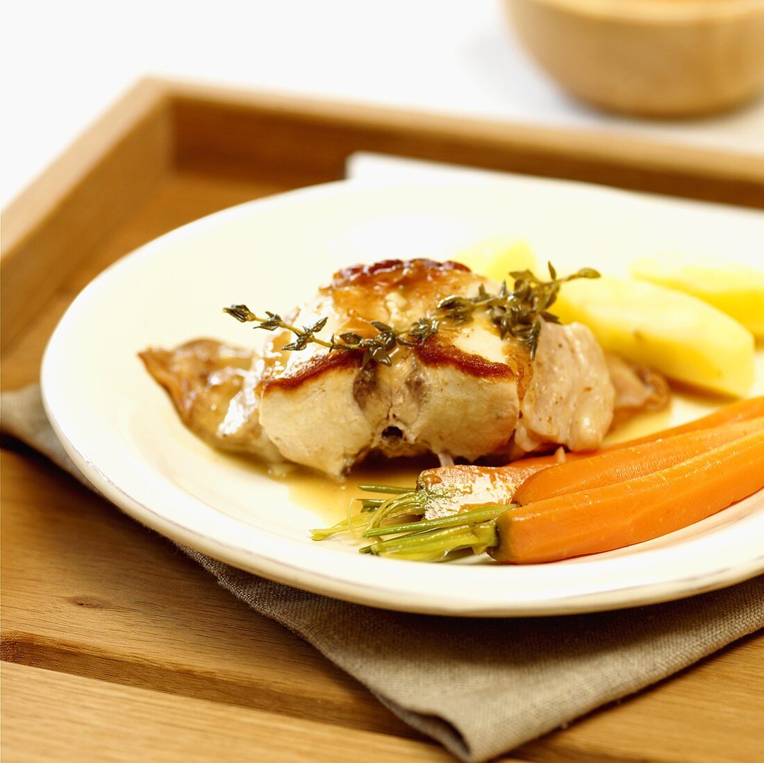Saddle of rabbit with carrots and potatoes