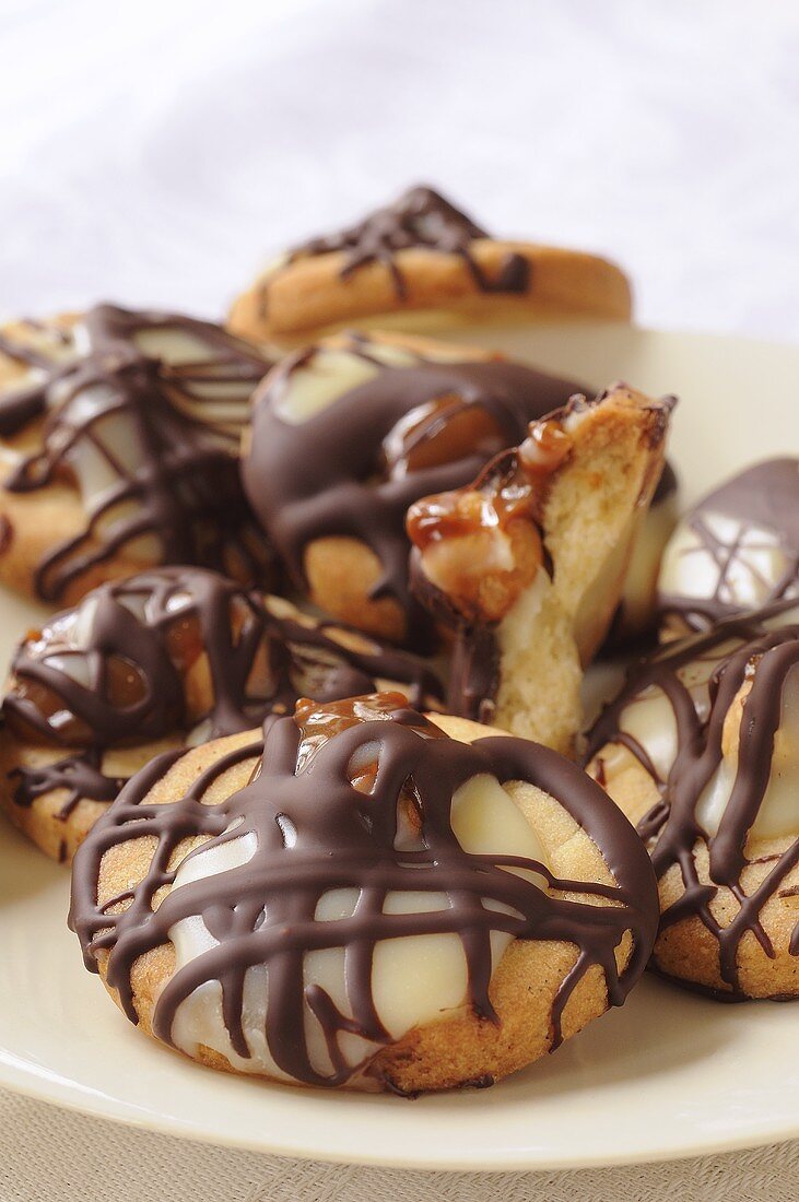 Biscuits decorated with chocolate and caramel