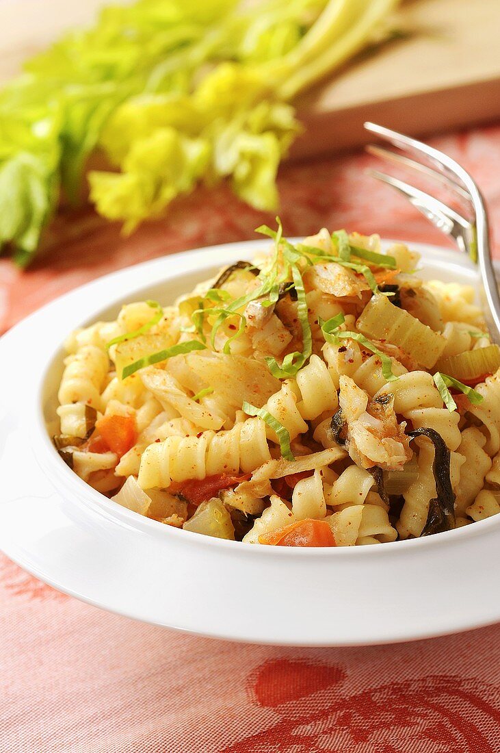 Spiral pasta with cod and celery
