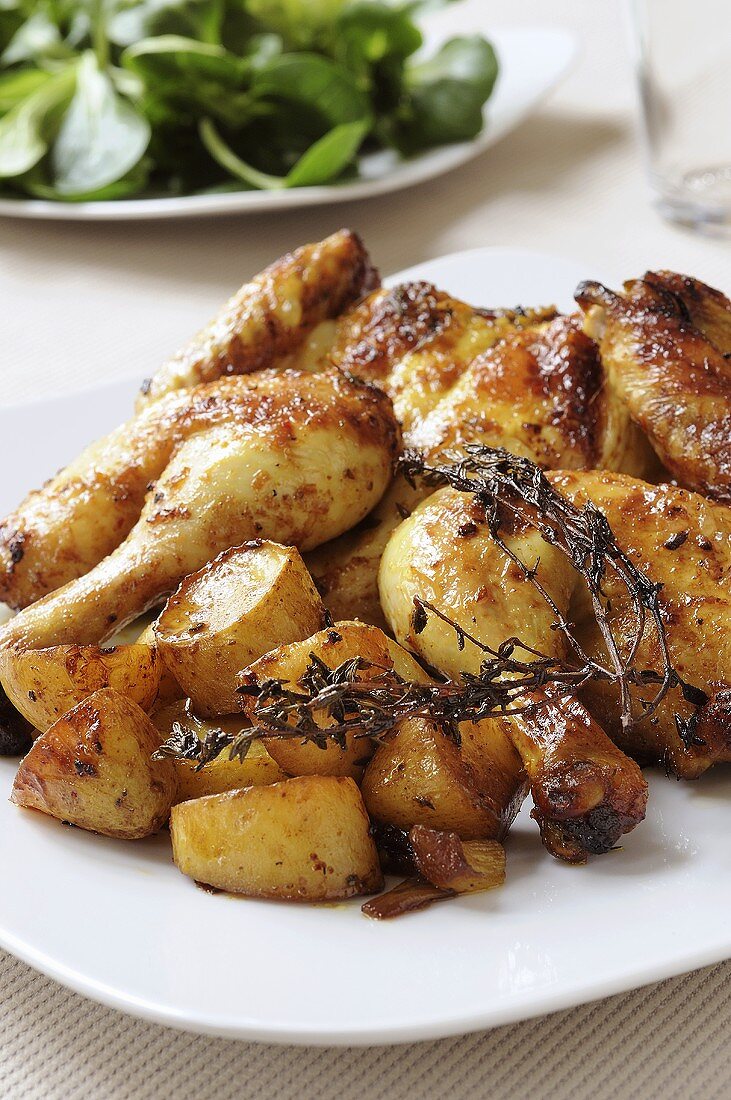 Roast lemon chicken with potatoes and thyme