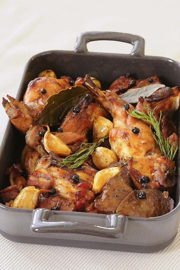 Braised rabbit in beer sauce with juniper berries