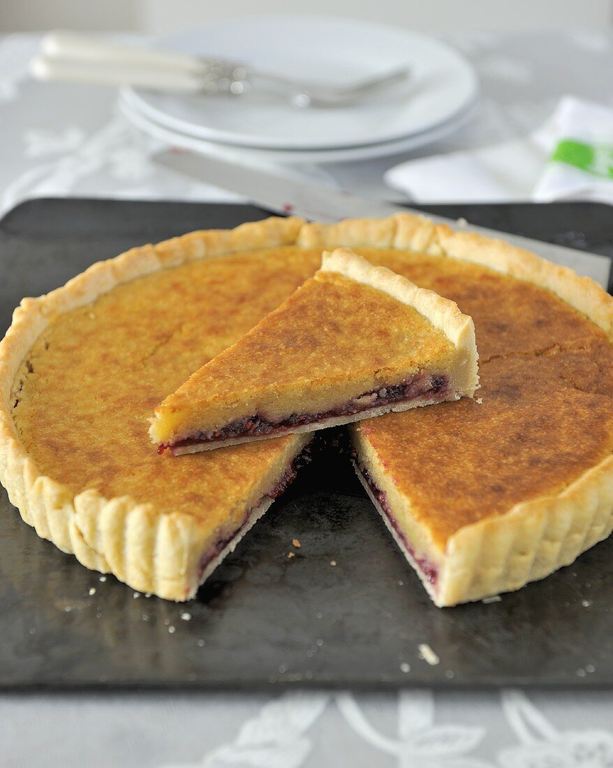 Raspberry almond tart, a piece cut