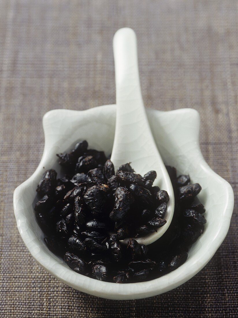 Fermented black beans in a small dish