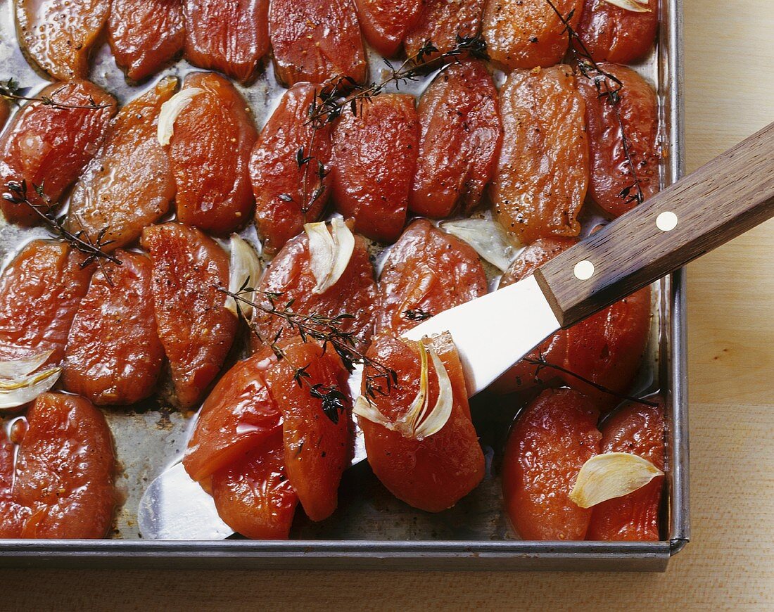 Dried tomatoes on a baking tray