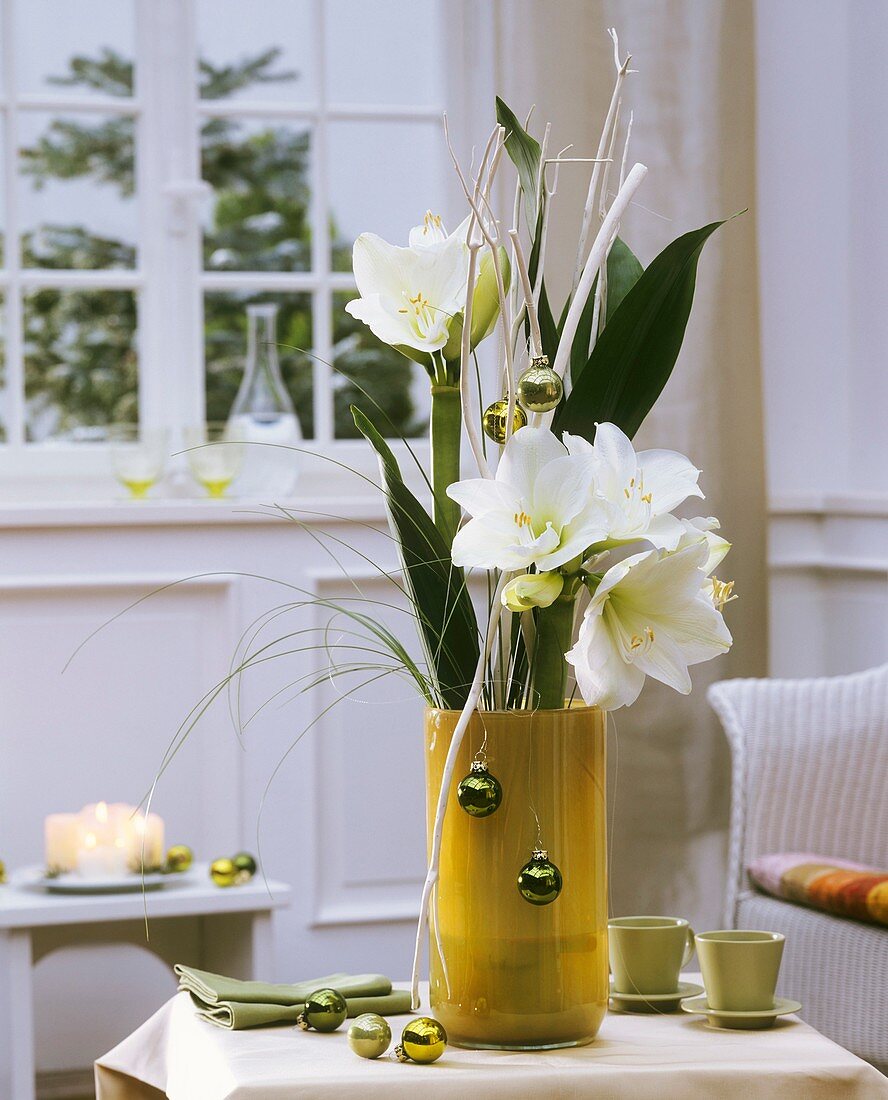 Christmas arrangement of amaryllis, aspidistra, bear grass