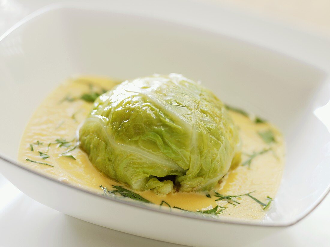 Savoy cabbage leaf stuffed with goose liver in white wine sauce