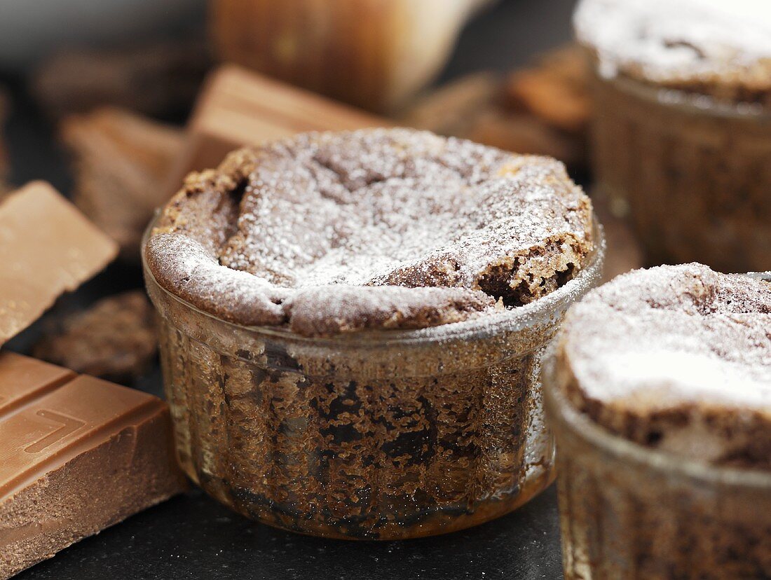 Chocolate soufflés in glass dishes, cooking chocolate