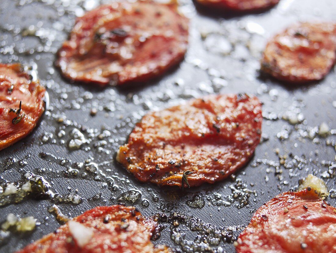 Dried tomatoes with oil, garlic and herbs