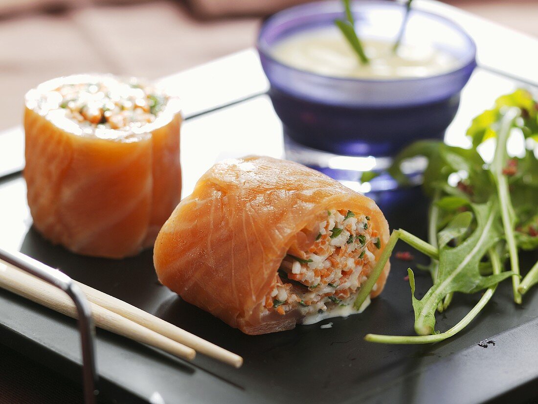 Smoked salmon rolls filled with vegetable sticks
