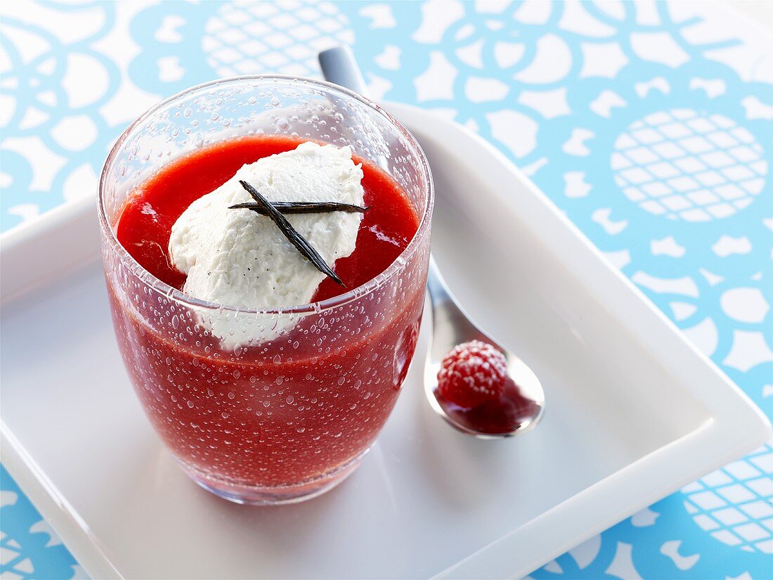 Berry puree with fresh goat's cheese in a glass