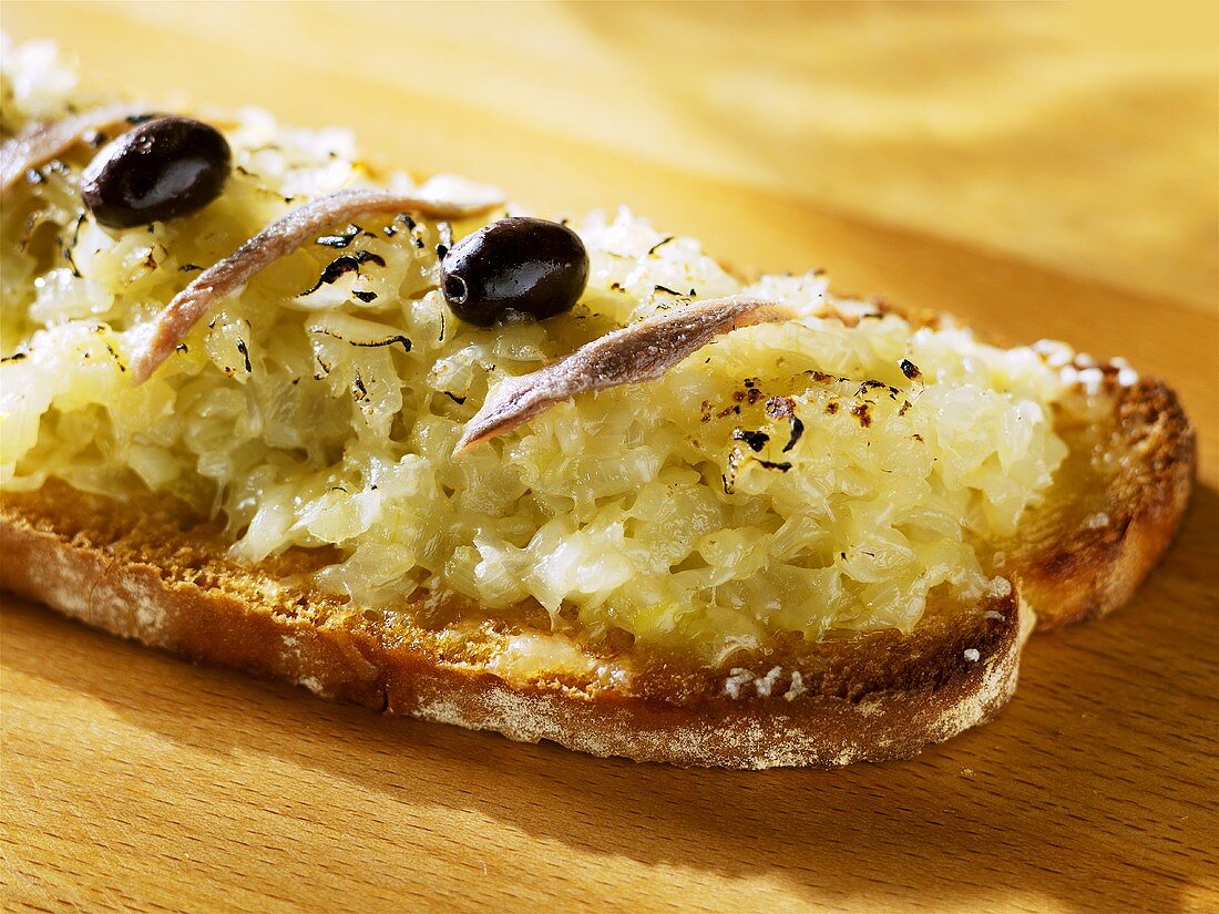 Onion, Parmesan and anchovies on wholemeal toast
