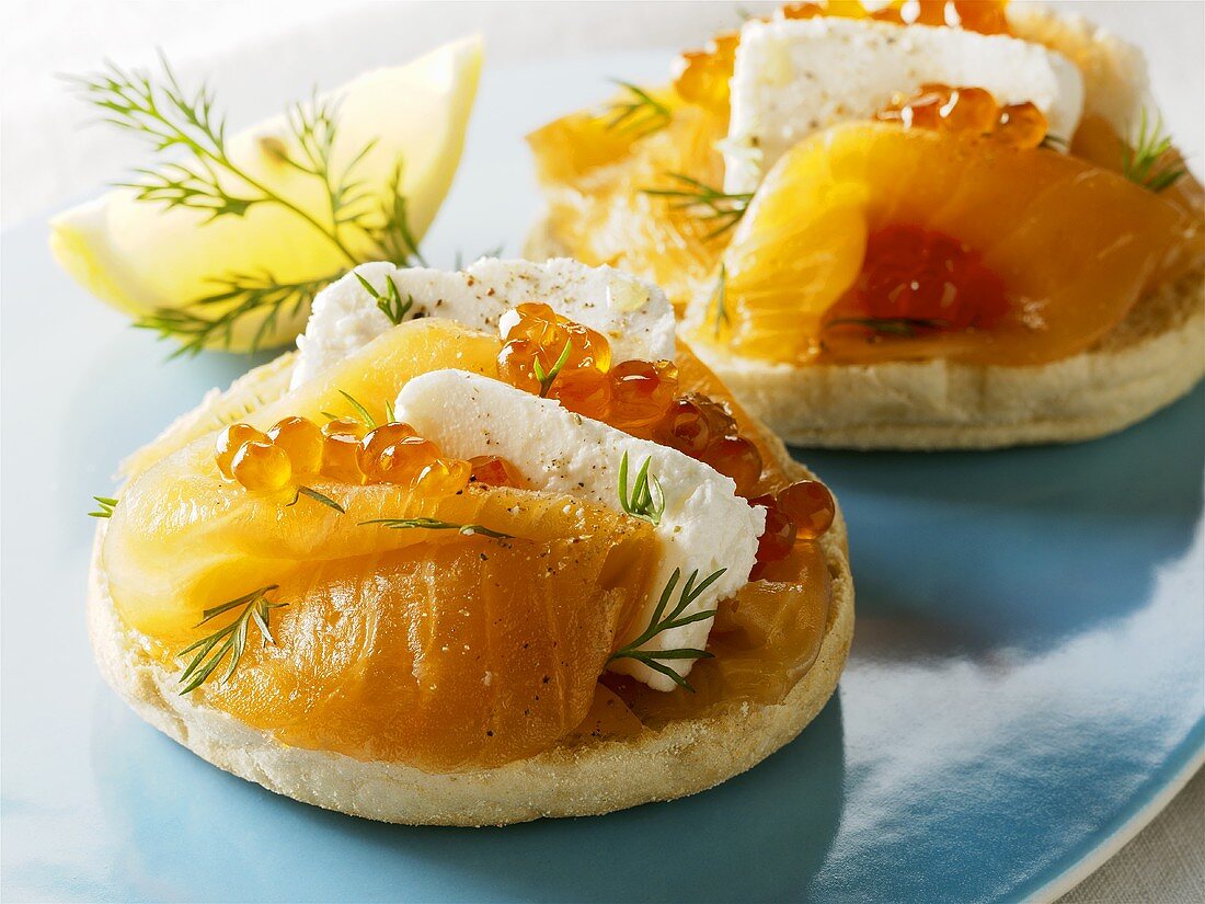 English muffins with smoked salmon, salmon caviar, soft cheese