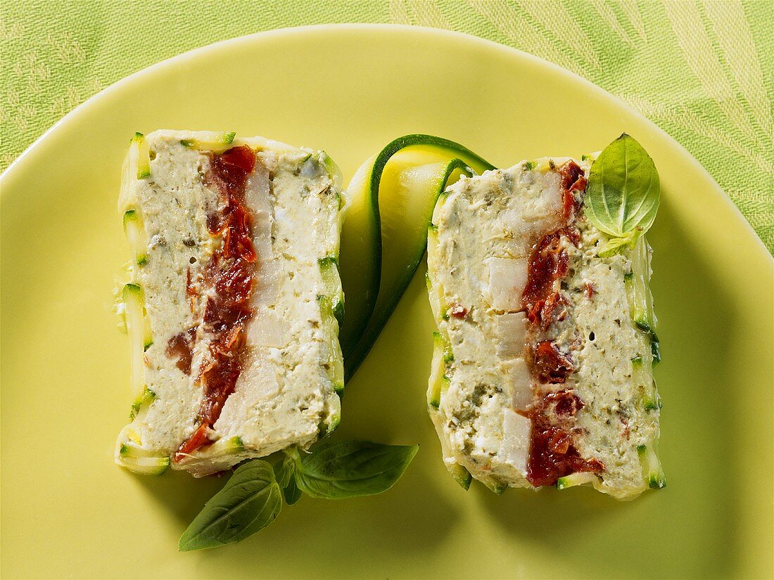 Artichoke and soft cheese terrine with dried tomatoes