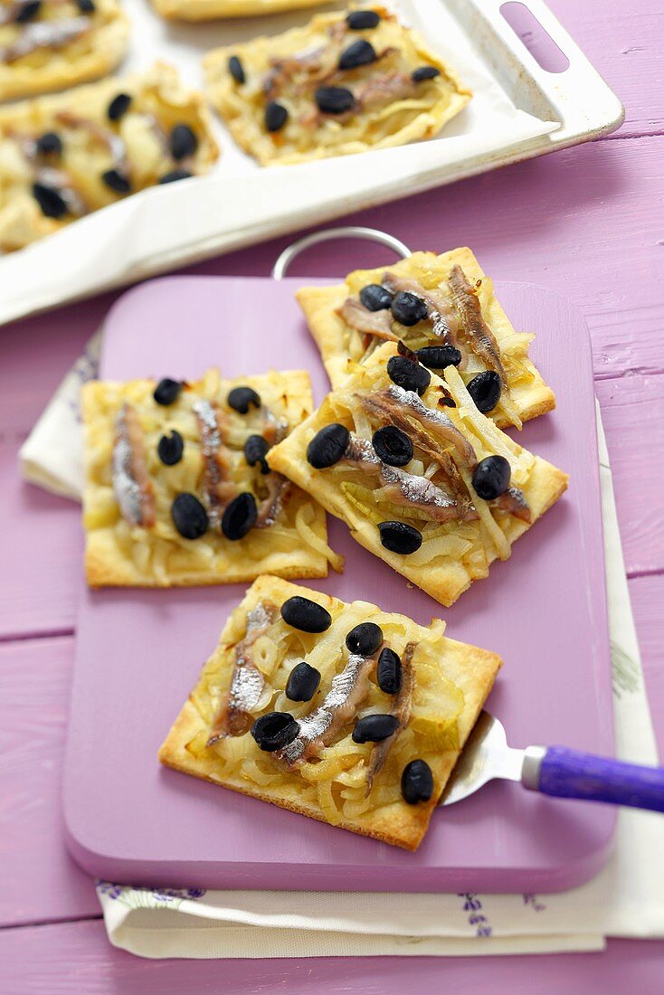 Pieces of pissaladière (Onion and anchovy tart, Nice)