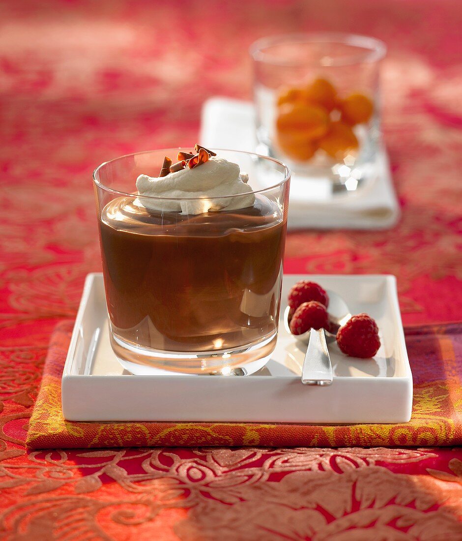 Chocolate dessert with liqueur cream in a glass