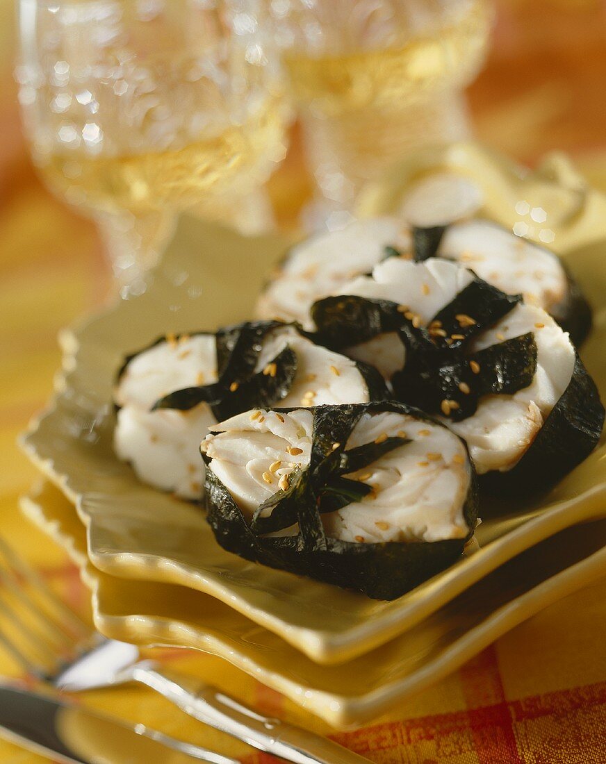 Cod with sesame seeds steamed in nori leaves