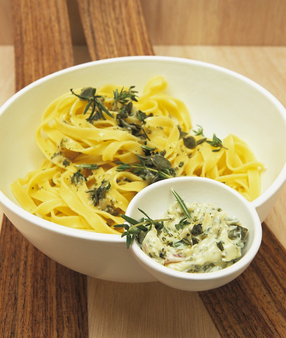 Tagliatelle with nut and herb butter in a bowl