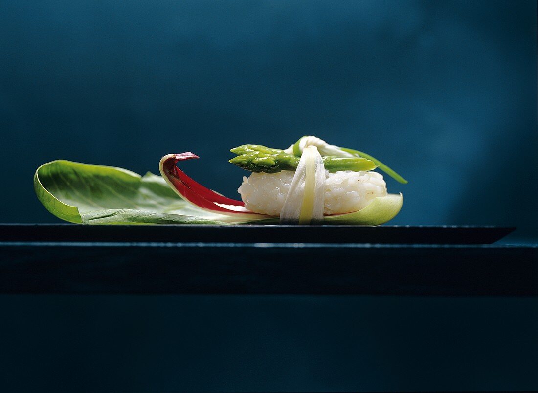 Vegetarian sushi with green asparagus and pak choi